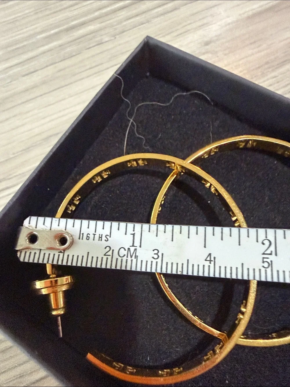 Tory Burch gold tone